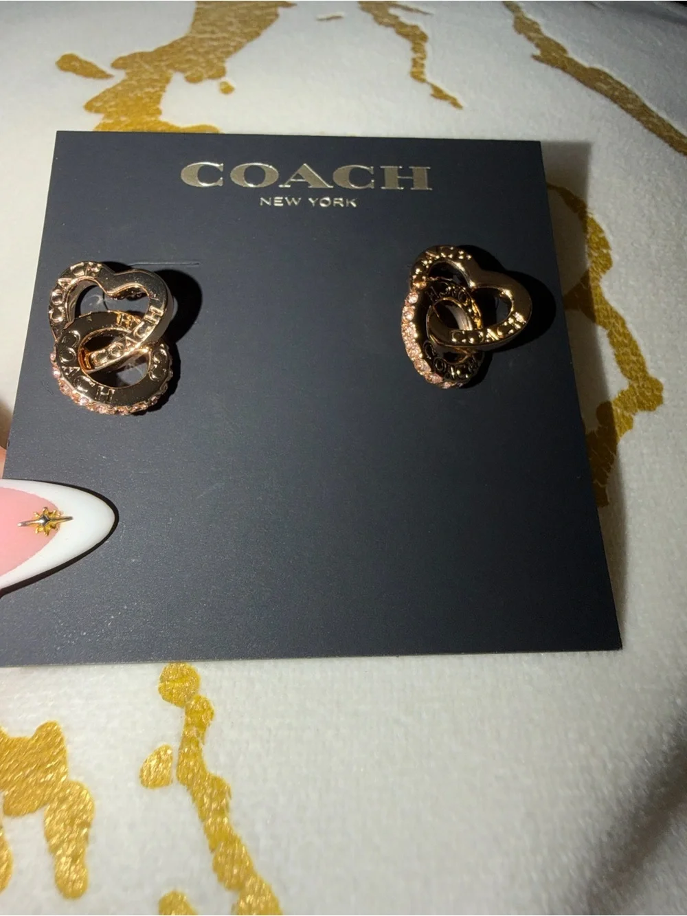 Coach gold tone